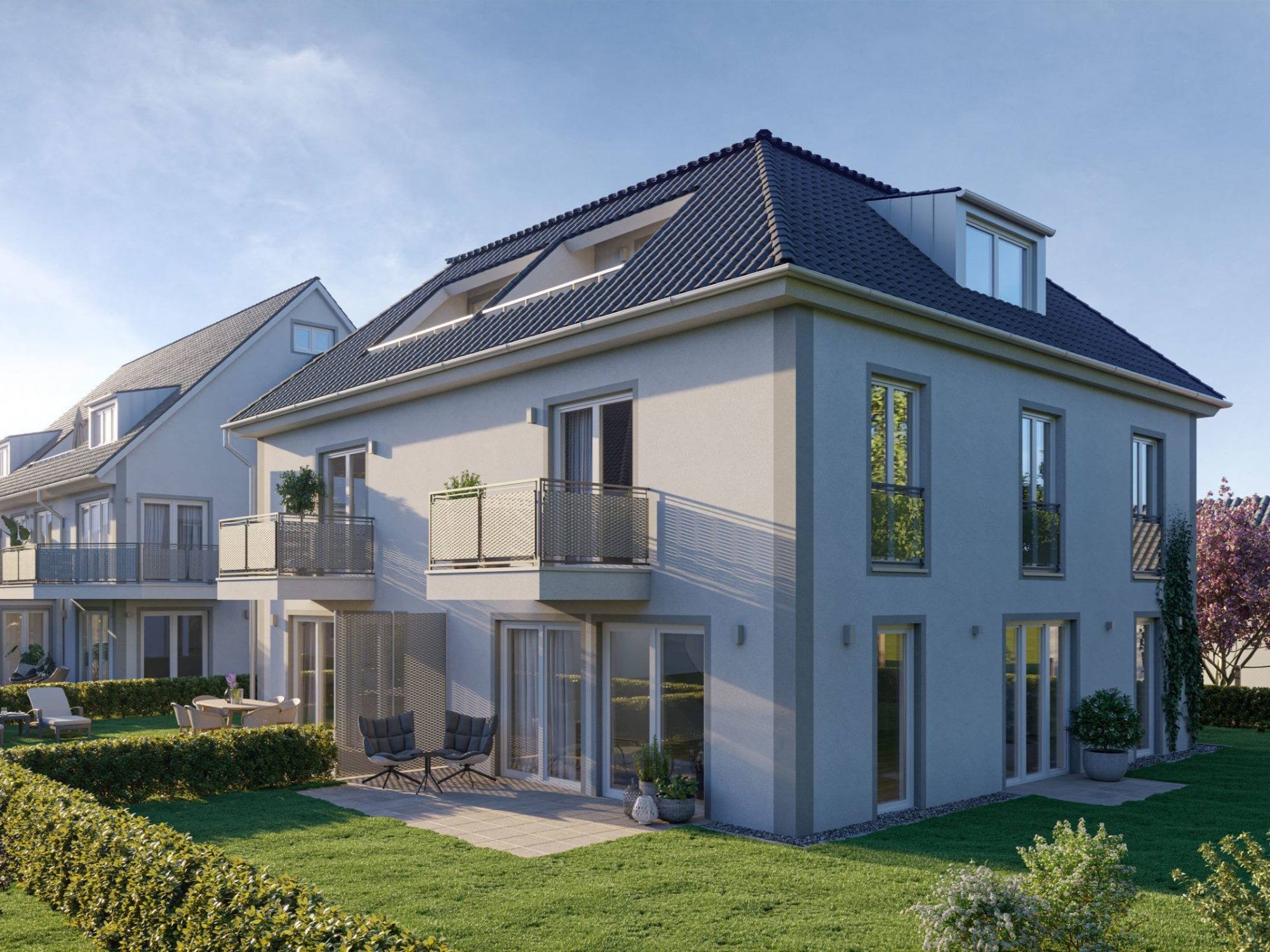 Neubau von Mehrfamilienhaus und Doppelhaushälfte in Massivbauweise